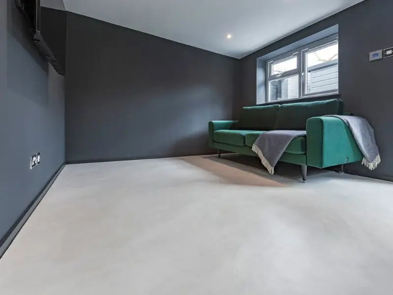 Seamless microcement finish showing the hand-troweled texture of the cured mineral coating
