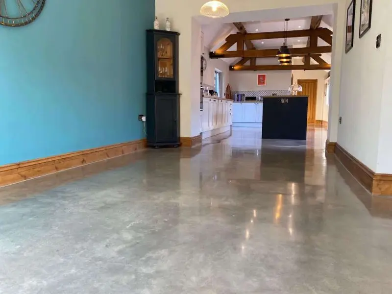 Polished concrete floor showing the natural aggregate reveal and light-reflective finish