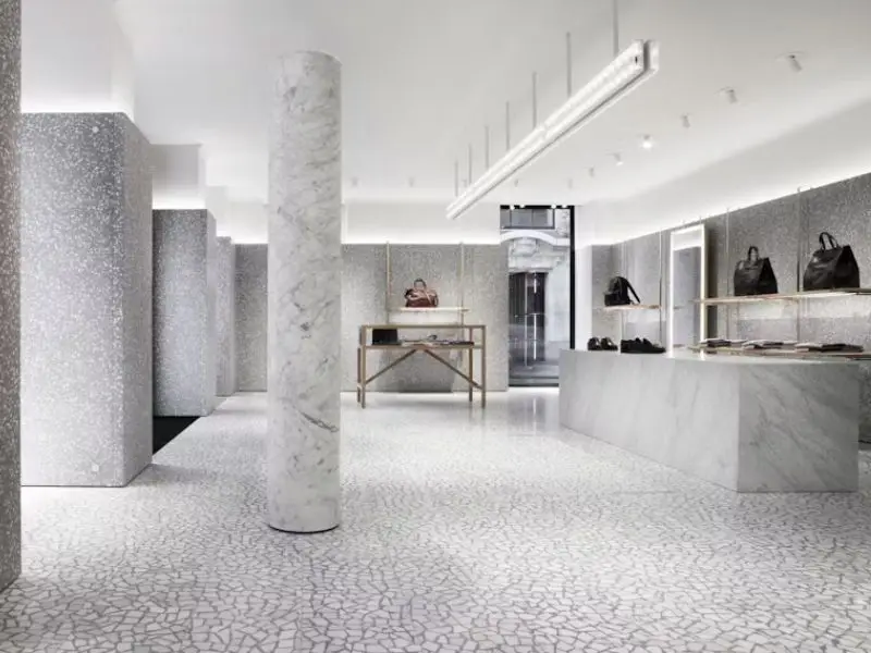 In-situ poured terrazzo with divider strips set into the structural joint layout