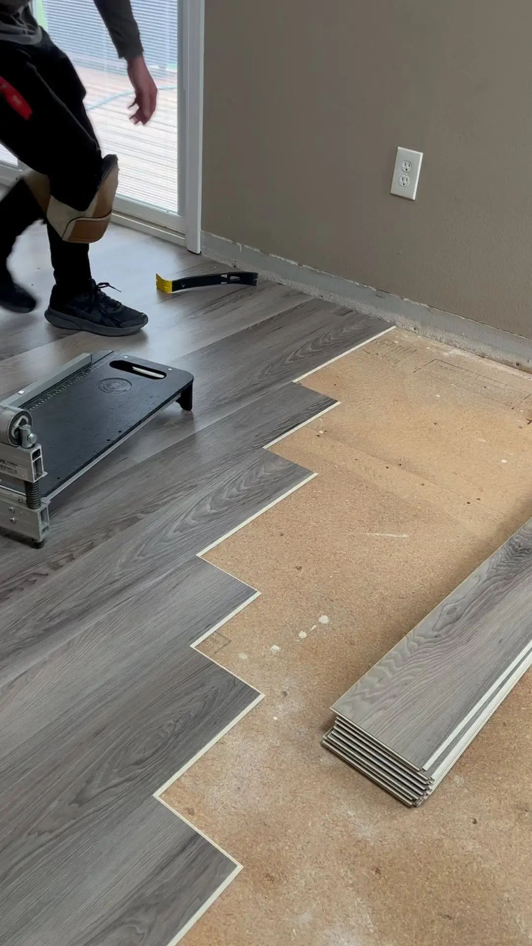 Floroz specialist assessing an existing surface before installation